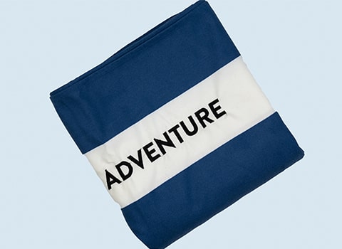 Cobra RIBs Merchandise Navy Towel with the word Adventure